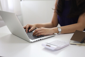 Fototapeta premium Coronavirus. Business woman working from home. Concept home quarantine prevention COVID-19 Coronavirus outbreak situation at home during coronavirus quarantine. Isolation at home to prevent 