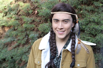 Young Native American man with traditional look