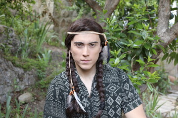 Young Native American man with traditional look