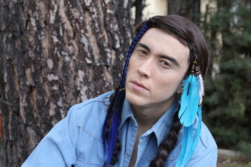 Fototapeta premium Young Native American man with traditional look