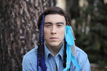 Young Native American man with traditional look