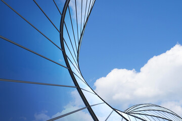 Low angle view of futuristic architecture, Skyscraper of office building with curve glass window, 3D rendering. © nuchao