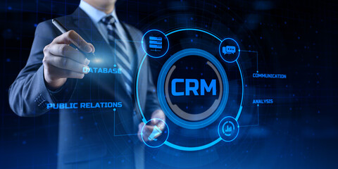 CRM Customer relationship management concept. Businessman pressing button on screen