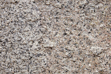 Closeup of stone texture and background with natural rough pattern.