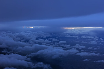 Clouds in dark sky and horizon line