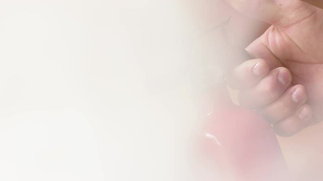  Close up shot of a hand grabbing a fire extinguisher and pulling the trigger.