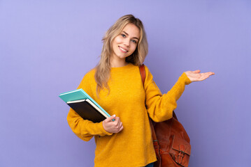 Teenager Russian student girl isolated on purple background extending hands to the side for inviting to come