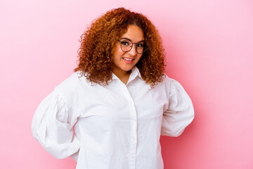 Young latin curvy woman isolated on pink background happy, smiling and cheerful.