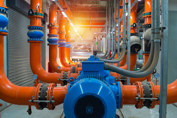 pipes and valves.Industrial water condenser pump and  HVAC  air conditioning system and pipping line of industrial construction at Chiller plant  room system in the factory. - obrazy, fototapety, plakaty