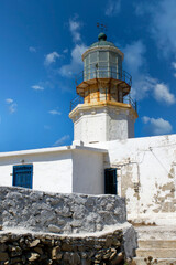 Fototapeta na wymiar Abandoned lighthouse, on the island of Mykonos Greece, on a summer day