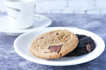 Close up of cookies and tea on table 