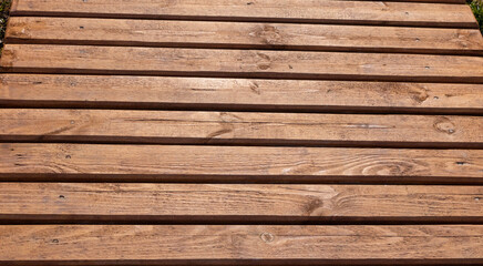 Fototapeta premium Wooden plank ladder walkway in the yard