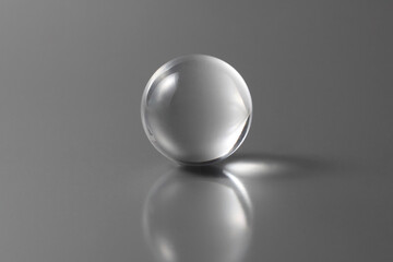 tranparent ball on a grey background with copy space for your text