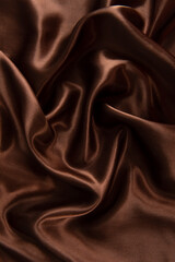 Fototapeta premium brown or chocolate silk satin fabric texture background