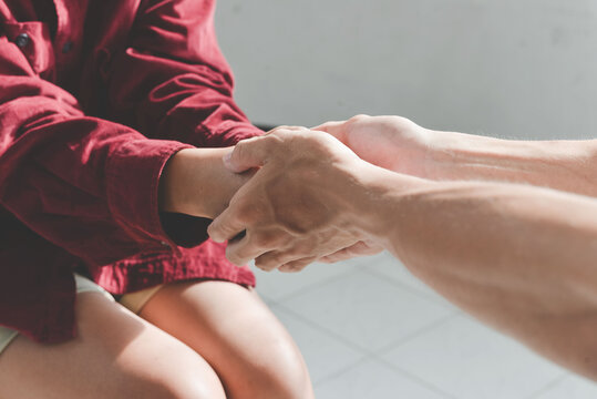 Christian couple holding hands. Two people are praying together. pray together, Hands folded in prayer concept for faith