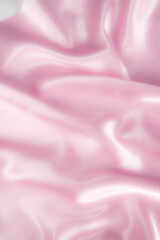 Abstract black silk fabric texture background. Cloth soft wave. Creases of satin