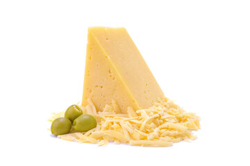 Hard yellow gouda cheese and grated cheese with green olives close-up, isolated on a white background.selective focus.