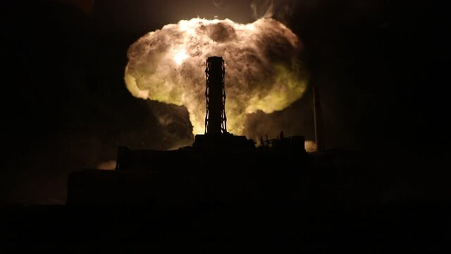 Creative artwork decoration. Chernobyl nuclear power plant at night. Layout of abandoned Chernobyl station after nuclear reactor explosion. Selective focus