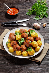 Italian meatballs and pasta balls on a plate