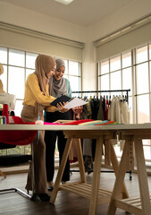 Muslim women run a small business in their own homes