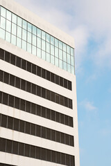 Glass business skyscrapers in downtown Los Angeles against a blue sky