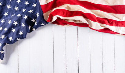 Happy memorial day concept made from american flag on white wooden background.