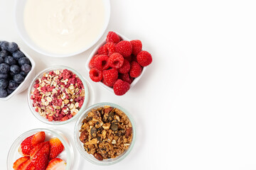 Ingredients for a healthy breakfast. Muesli, berries and yogurt. Healthy eating. Sports fitness menu. Concept. High quality photo