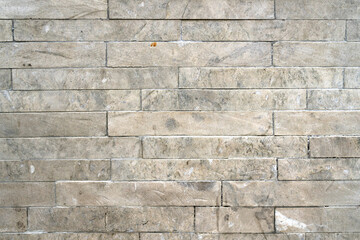 Texture of old wall made of stone blocks