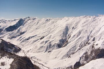 Caucasus mountains in the snow, aero view
