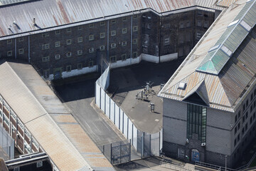 An aerial view of a HMP prison taken from a helicopter in the United Kingdom. The old grey Her...