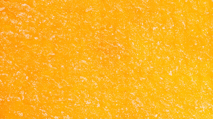 Bright orange texture of mango jerky slice