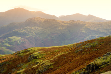 Sunset view of the Lake District, famous for its glacial ribbon lakes and rugged mountains. Popular vacation destination in Cumbria, North West England.