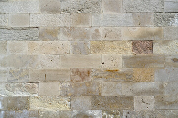 Texture of old wall made of stone blocks