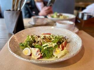 Caesar salad with chicken and sauce