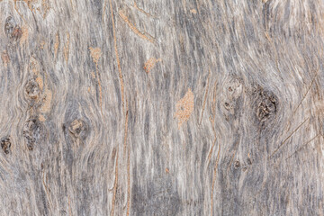 Wooden background with sand in the check.