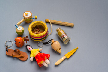 Handicrafts and souvenirs from northeastern Brazil on neutral gray background.