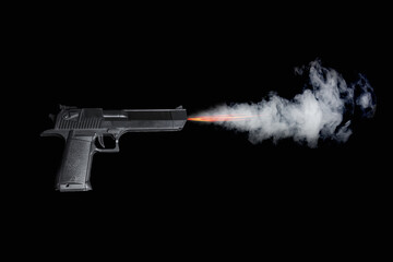Black pistol shooting with fire and smoke on dark background.