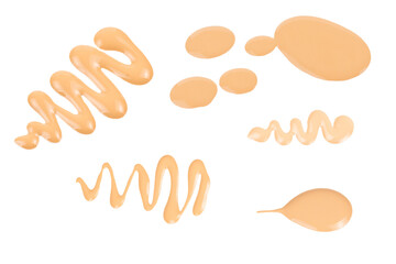 Liquid foundation swatch isolated on white background. Close Up of makeup cream sample.