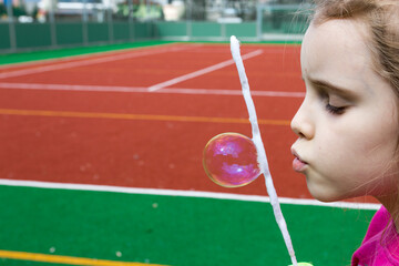 child playing with ball
