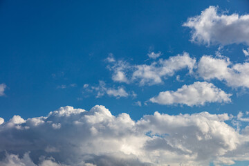 Clouds on blue sky background, copy space