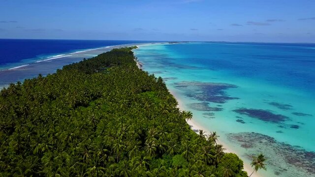Blue sea Bahamas, beach sand, exotic palm trees, white sand, white sand beach Top view of the beach in the Caribbean turquoise Sea water. Paradise Island, a very beautiful beach with white sand.