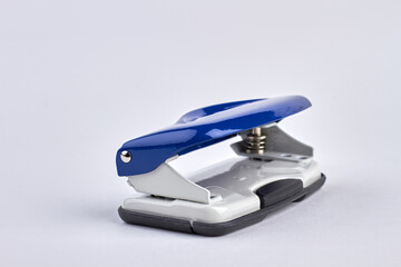 Side view of new office stapler isolated on white background.