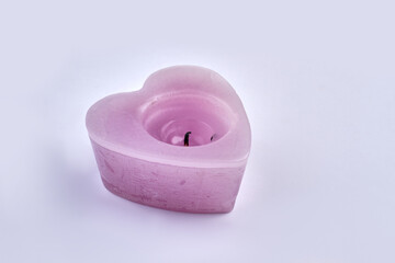 Decorative candle in a shape of heart.