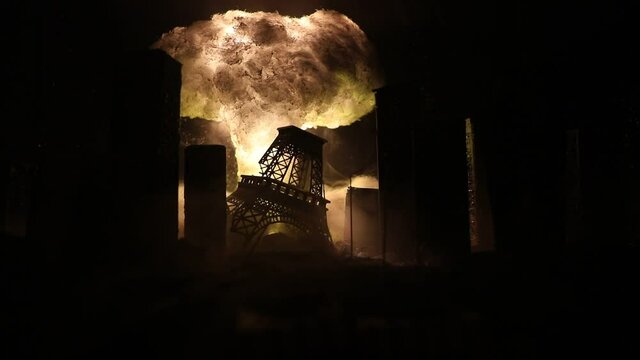 Nuclear war concept. Explosion of nuclear bomb. Apocalyptic view of city downtown after bombing. Night scene. City destroyed by war.