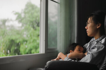 Tired Mother Suffering from experiencing postnatal depression.Health care single mom motherhood stressful.