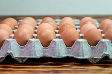 Natural organic chicken eggs of poultry in carton paper 