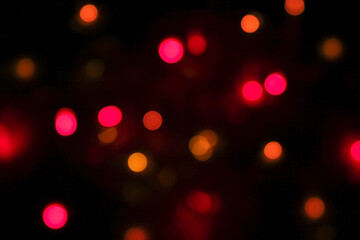 colorful bokeh lights on a black background