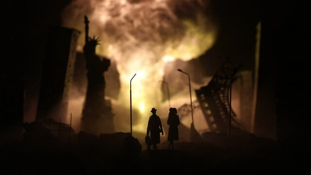 Nuclear war concept. Explosion of nuclear bomb. Apocalyptic view of city downtown after bombing. Night scene. City destroyed by war.