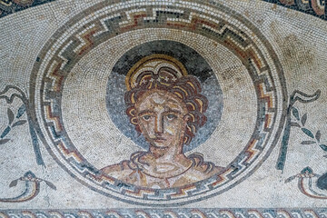 Obraz premium Mosaic floor tiles from a Roman Villa in West Sussex, England. Shows Venus the Roman God looking down