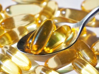 Omega-3 cod liver oil in a white container and with a white background picture.